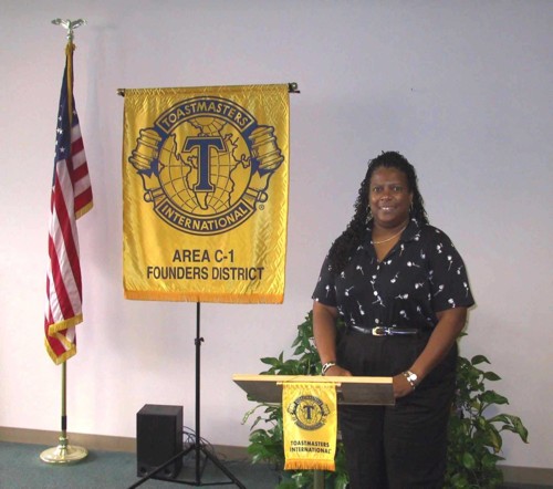 Elaine Smith is poised for some good speech action at the lectern!